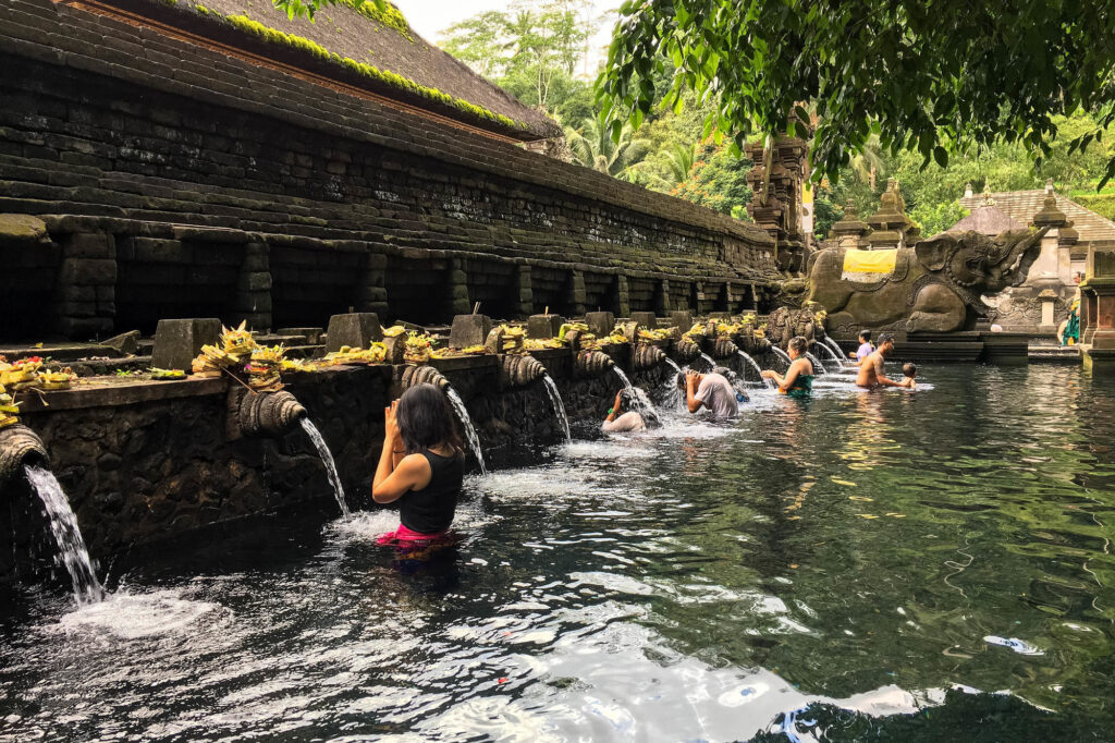 Praying bathers in the pools at Pura Tirta Empul in Bali