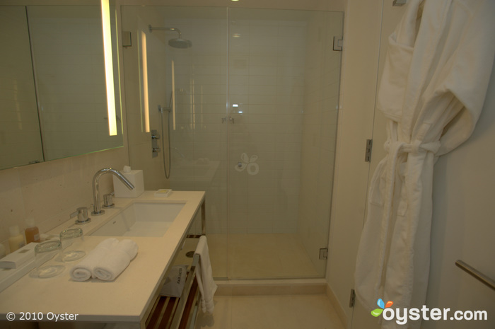 The bathrooms feature Angelo Carli bath amenities and have big showers -- but no tubs.