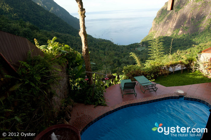 Villas lack a fourth wall and feature private plunge pools and stunning views.