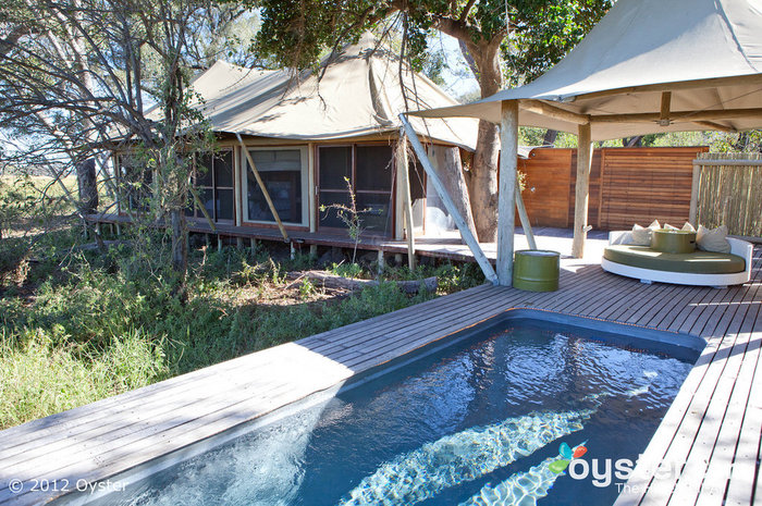 Rooms feature private plunge pools with a big cushioned lounger perfect for canoodling — but watch out for lions!