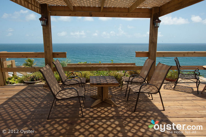 The rooftop wine deck offers stunning views of the Caribbean Sea and the surrounding Spanish colonial architecture of Old San Juan.