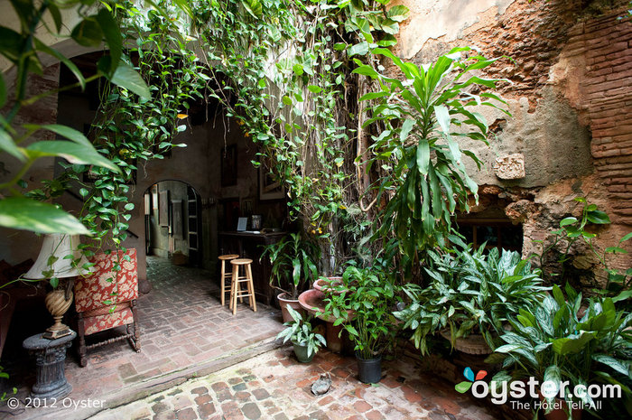 The property features many lush gardens and on-site artists' studios.
