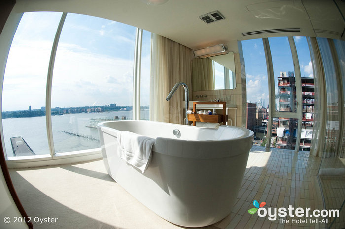 Bathrooms are luxurious and offer sumptuous views -- from both the inside and the outside. Exhibitionist couples will be sure to enjoy the experience.