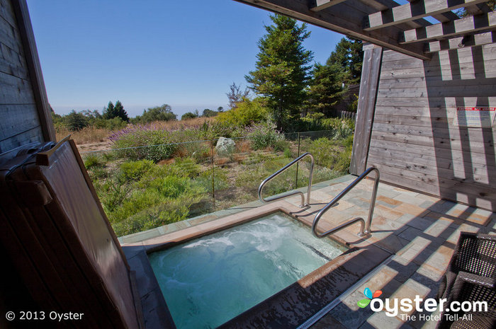 Many rooms feature private whirlpools looking out over the grounds.