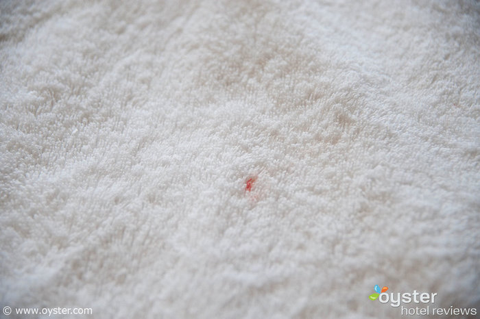 Apparent blood stain on the bath towel at the Starlite Hotel in South Beach, Miami.