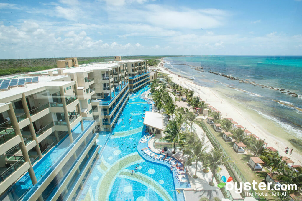 Pool and beach at Generations Riviera Maya by Karisma