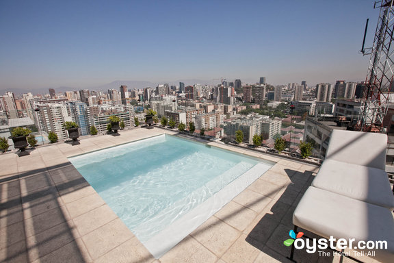 Onde Ficar: Gen Suite & Spa situé dans le centre de Santiago. Café de l'hôtel inclus et piscina pas de topo avec un panorama panorâmique de la cidade.