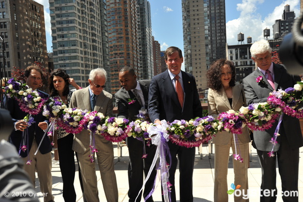 Grand opening ceremony at the Eventi Hotel, with broadway star Bebe Neuwirth (second from right) and Deputy Mayor Lieber (third from right)