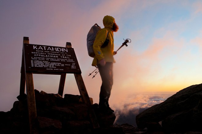Hiker atop Mount Katahdin, Photo courtesy of Flickr/Jeffrey Stylos Hiker atop Mount Katahdin
