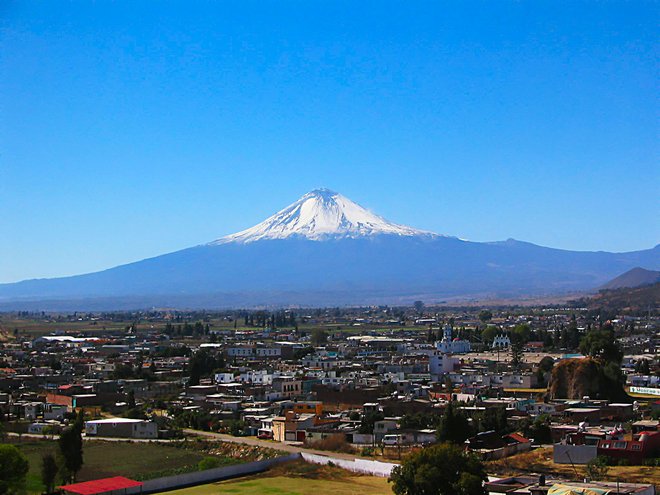 Cholula and Popcatepetl; Image courtesy of Russ Bowling via Flickr