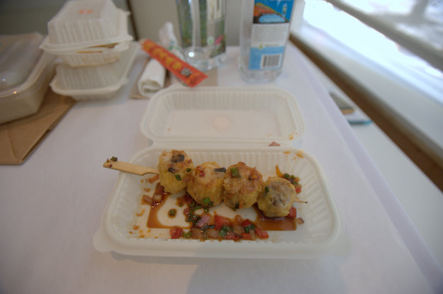 Skewered chicken and shrimp dumplings with chili soy sauce from RedFarm Stand ($5.50)