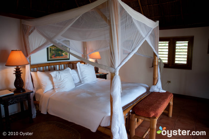 The bed in the Seagrape 2 cottage at Tensing Pen, Jamaica