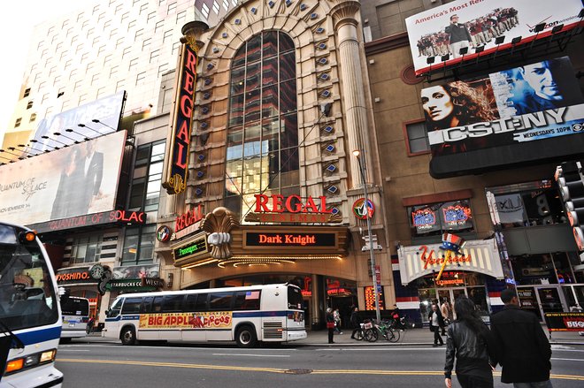 New York's city buses blazing through Times Square/Oyster