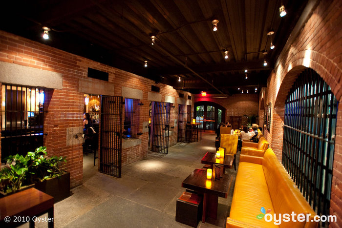 The drunk tank in the Liberty Hotel, also known as Alibi bar, has a historical atmosphere bar none