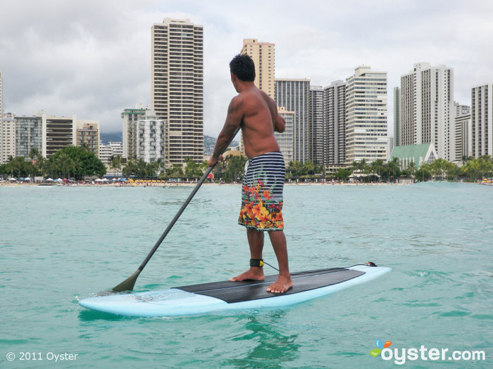 Paddle-boarding at Waikiki Beach; Honolulu, HI