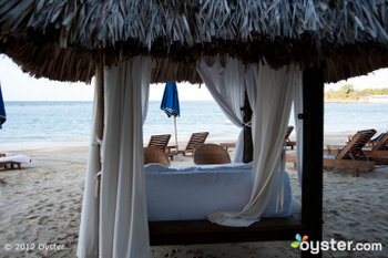 Imagine you and your significant other (or George Clooney) getting a massage by the ocean like this. Ahhh.