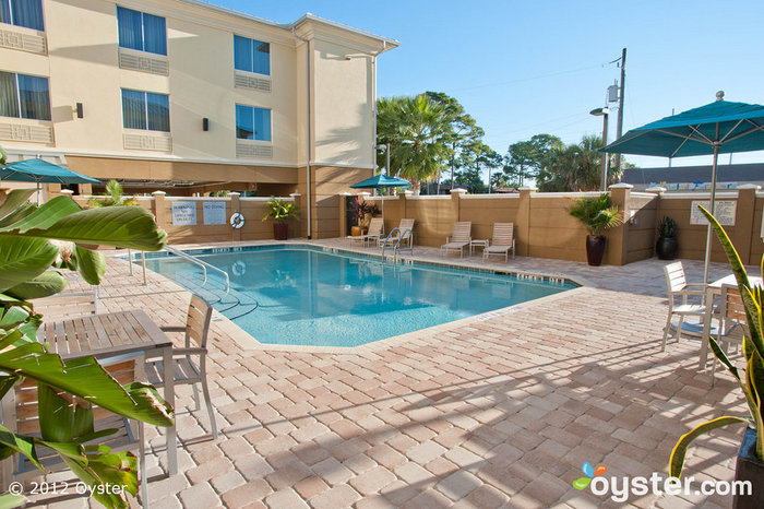 The heated pool and Jacuzzi at the Holiday Inn Express Jacksonville Beach is a relaxing find in a value hotel, perfect for families on a budget.