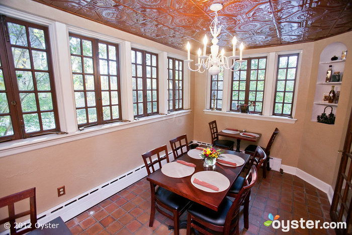 The windows in the breakfast room bring in a lot of natural light, no matter the season. And how much do you love the details in the ceiling?
