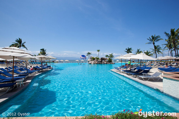 The hotel's infinity-edge pool overlooks a beautiful beach.