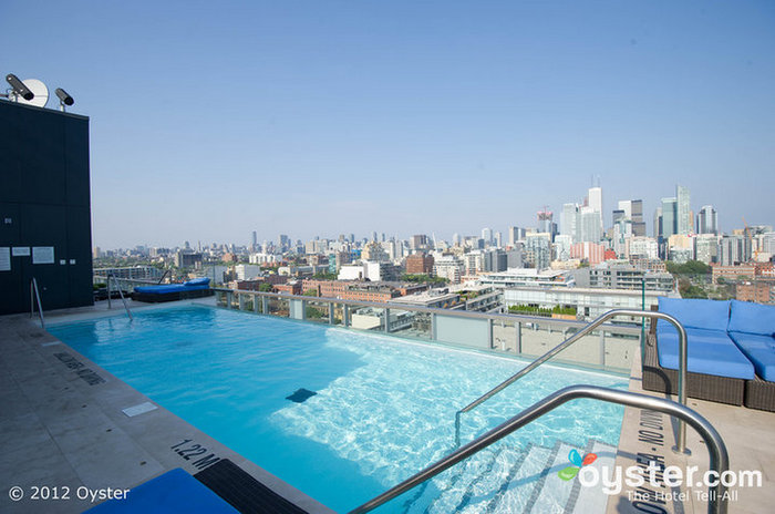The chic rooftop pool offers plenty of space for relaxing in the sun.