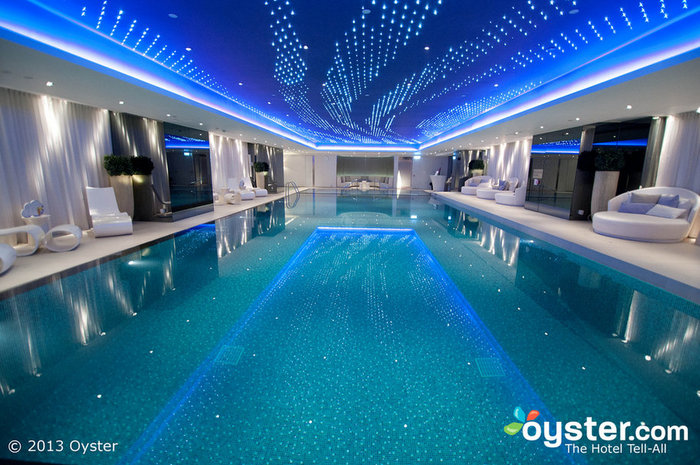 The pool is a highlight, with comfy loungers and futuristic lighting.