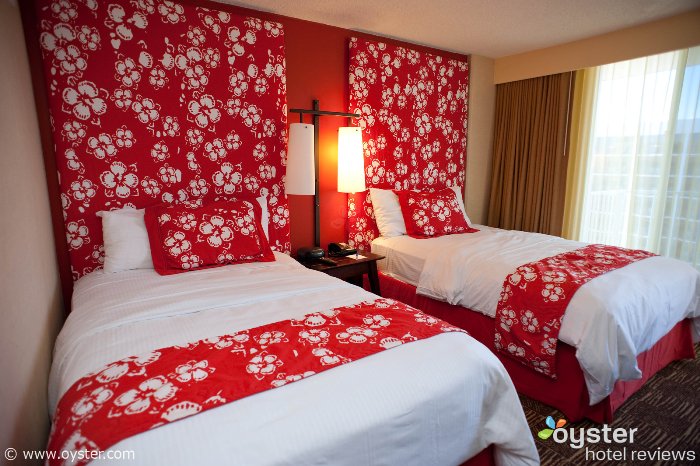 The funky, floral Ocean View rooms of the Aston Waikiki Beach Hotel