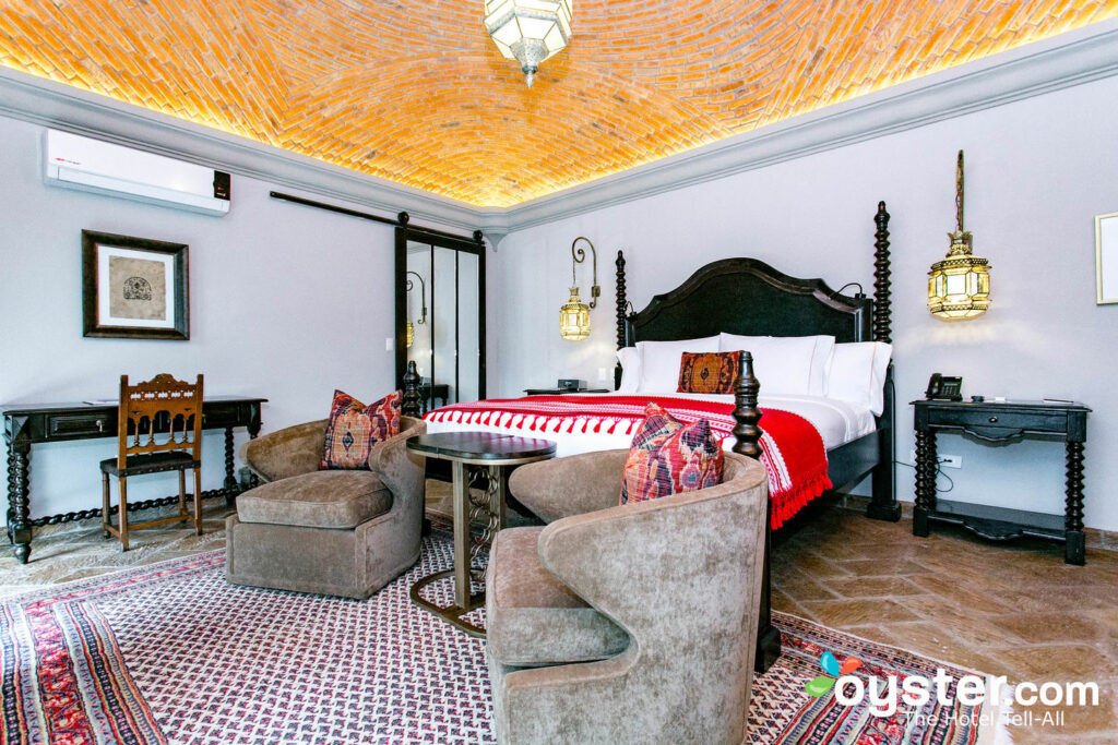 O Quarto Luxo na Casa 1810 Hotel Boutique / Oyster