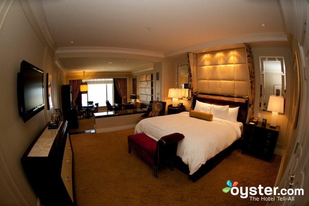 A standard king size bedroom at the Paris casino-hotel is seen on