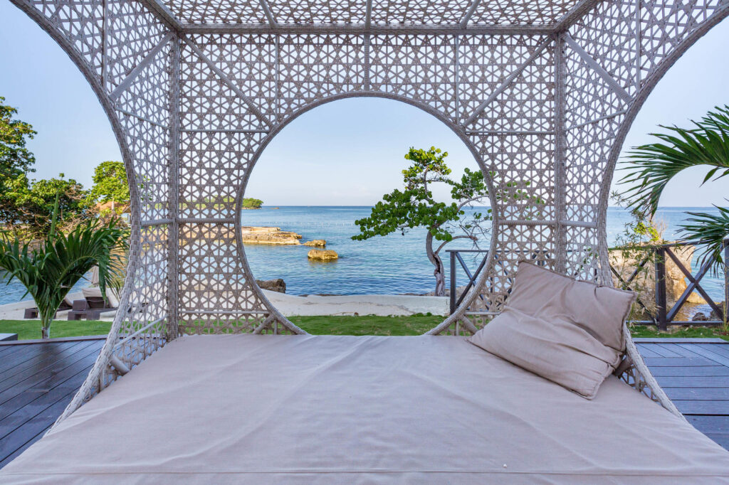 Lounge area by the beach at Grand Lido Negril Au Naturel All-Suite-Resort