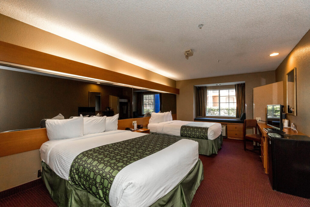 The Two Queen Beds Accessible Room at the Microtel Inn & Suites by Wyndham Tallahassee