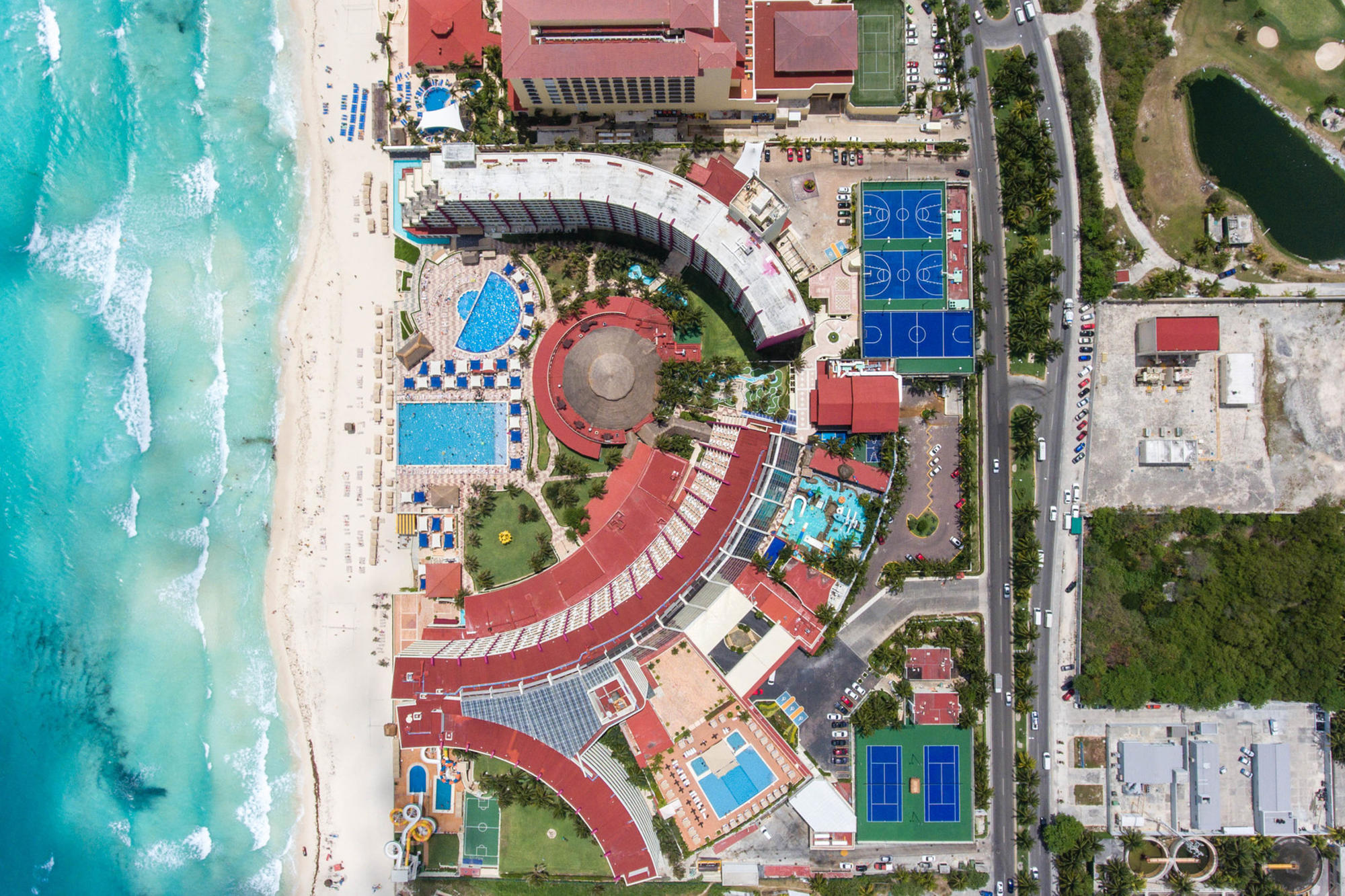 Aerial shot of the resort and Caribbean Sea at Crown Paradise Club Cancun