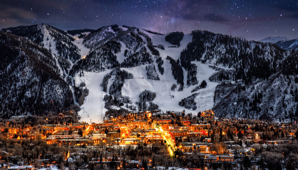 Aspen Colorado at night with mountains in background