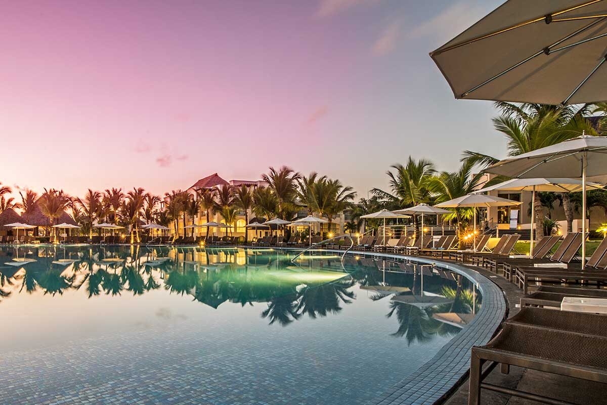 Pool at Hard Rock Hotel & Casino Punta Cana at sunset