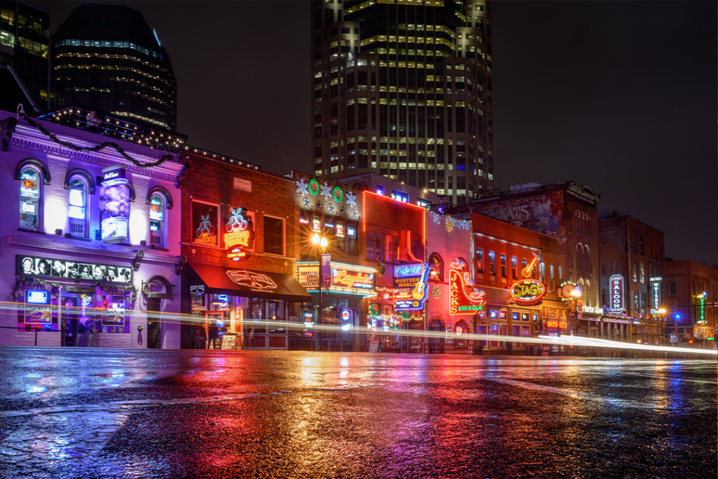 Nashville, Tennessee, December 6, 2022: Broadway Street on a rainy night.