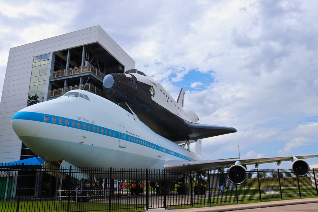 HOUSTON, TEXAS, USA - JUNE 9, 2018: The NASA Space Shuttle Independence and NASA 905 Shuttle Carrier Aircraft at Independence Plaza, Space Center Houston, Texas.