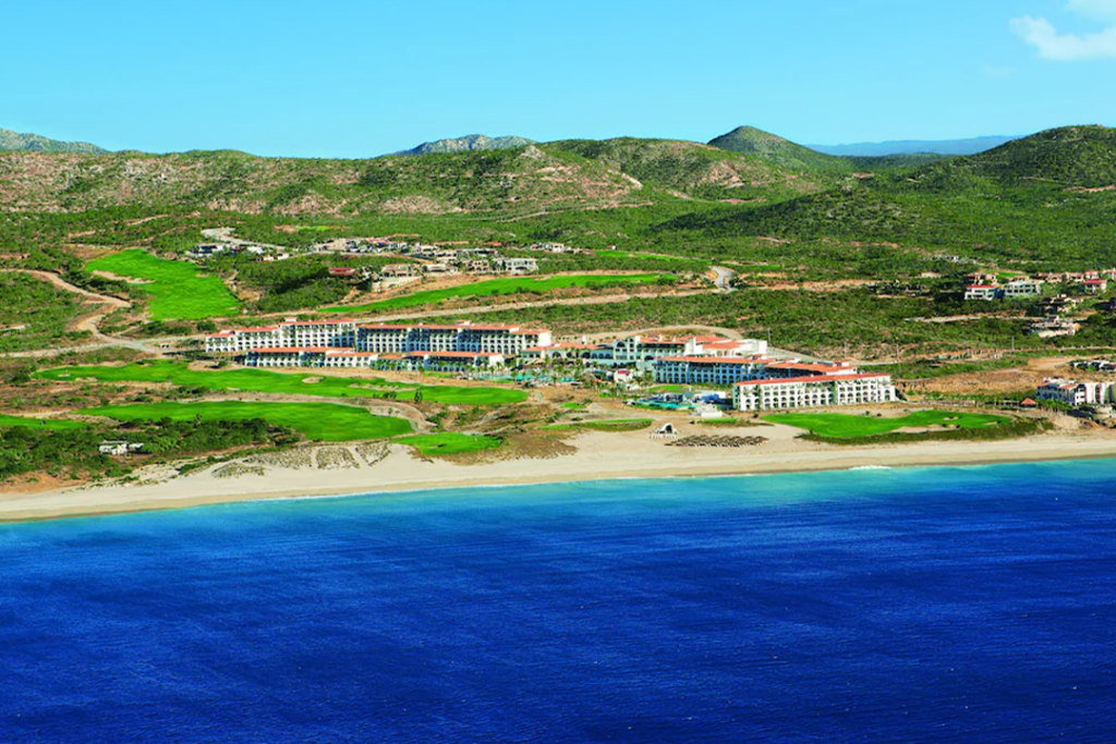 Aerial view from the ocean of the Secrets Puerto Los Cabos - Adults Only - All Inclusive property