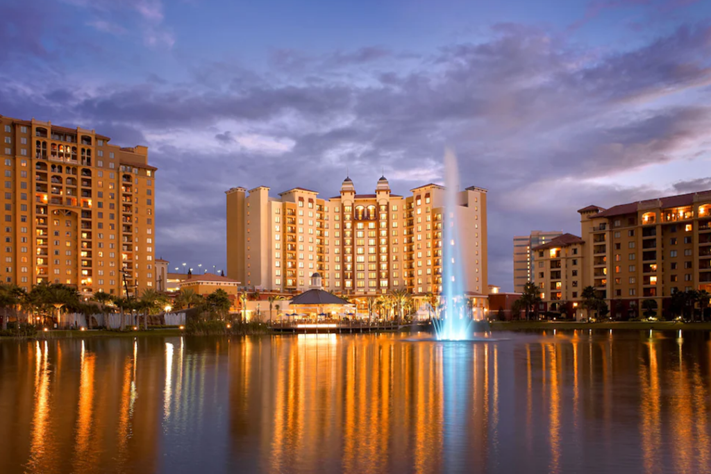 Exterior view from across the water of the Wyndham Grand Orlando Resort Bonnet Creek