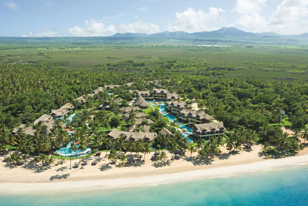 Aerial view of Zoetry Agua Punta Cana withthe mountains in the background