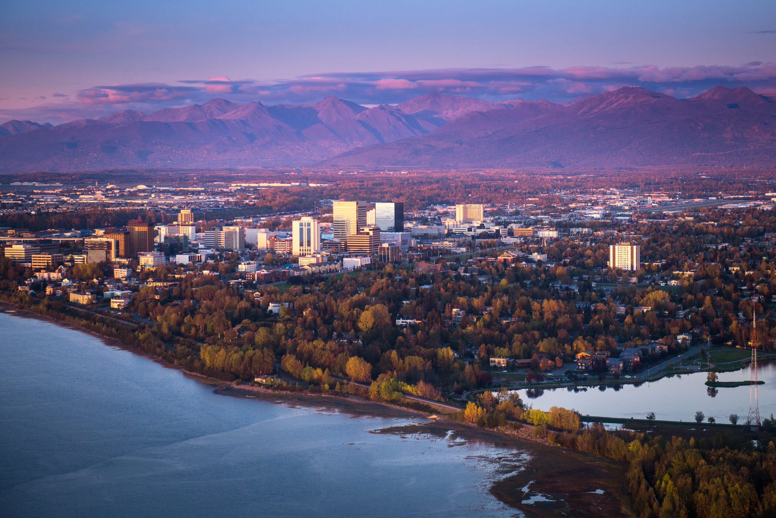 Aerial view of the Anchorage, Alaska skyline at dusk