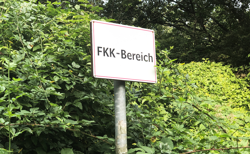 German sign FKK Bereich translates as nudist area - nudism or naturism in Germany
