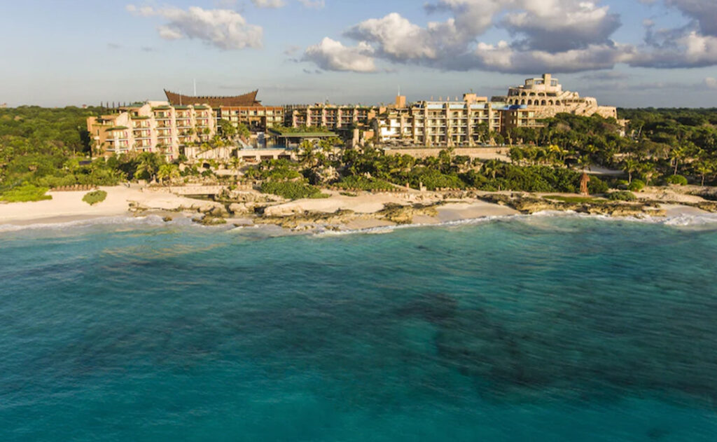 Aerial view of the Hotel Xcaret Mexico from over the ocean