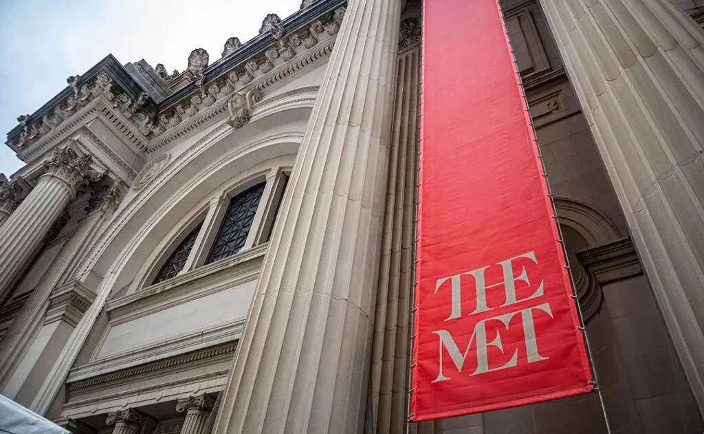 New York, Manhattan. The New York metropolitan museum, the MET entrance against blue sky background