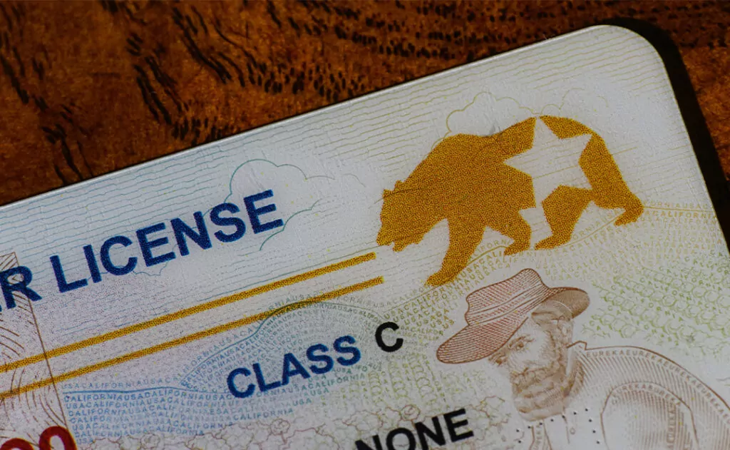Lake Elsinore, California, USA - Dec 18, 2022: Closeup of California Real ID driver license focusing on the REAL ID logo