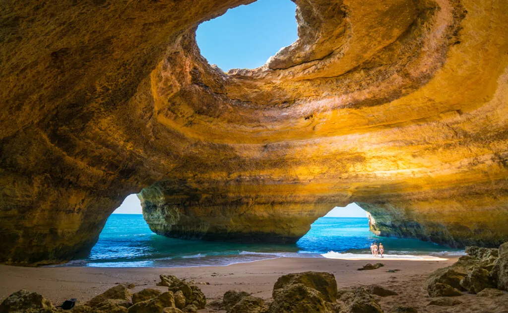 Carvoeiro, Portugal - June, 10, 2015 - Tourists enjoy a beautiful day to know the Benagil Cave in Algarve, one of the most wonderful caves in the world.